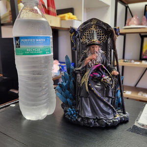 Pondering wizard in chair new with box